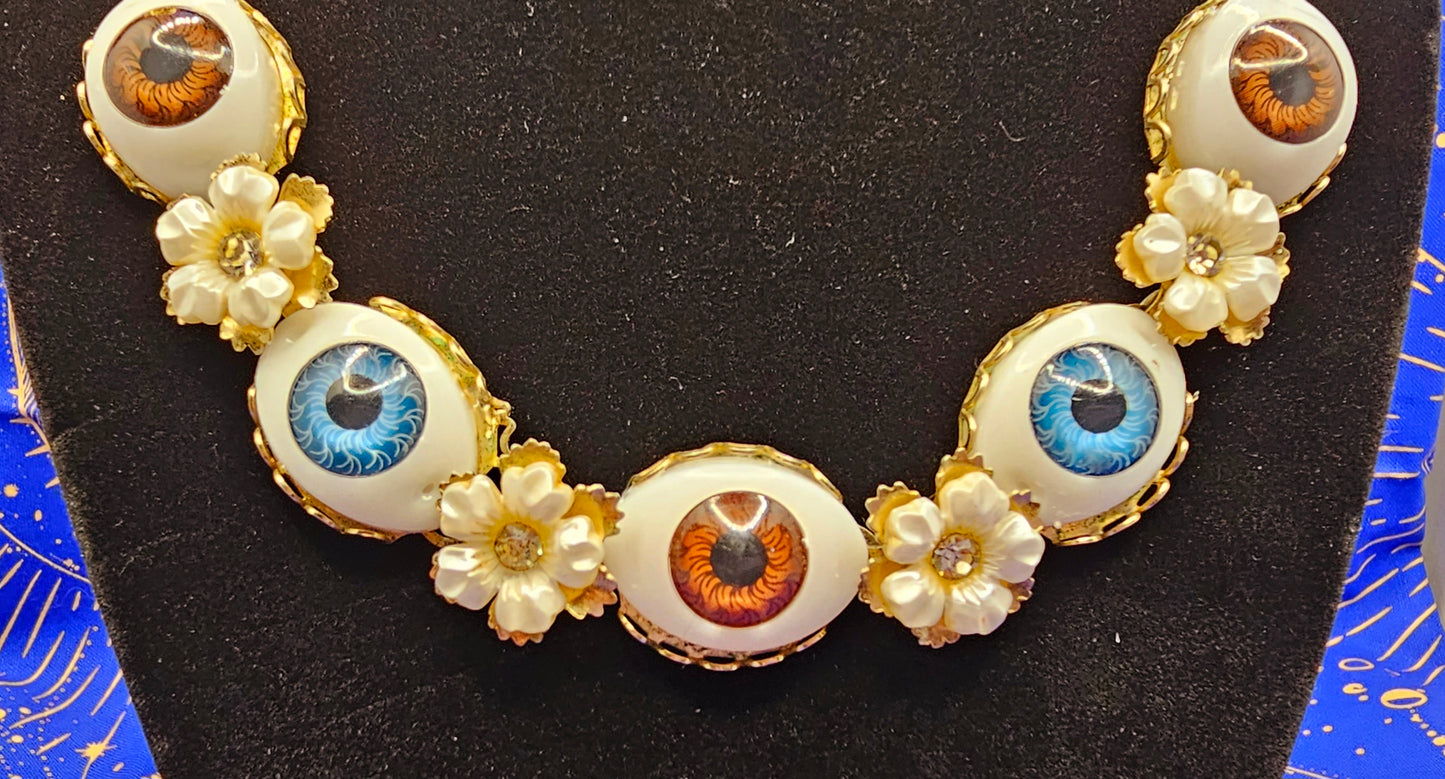 Doll Eyes on Vintage Necklace